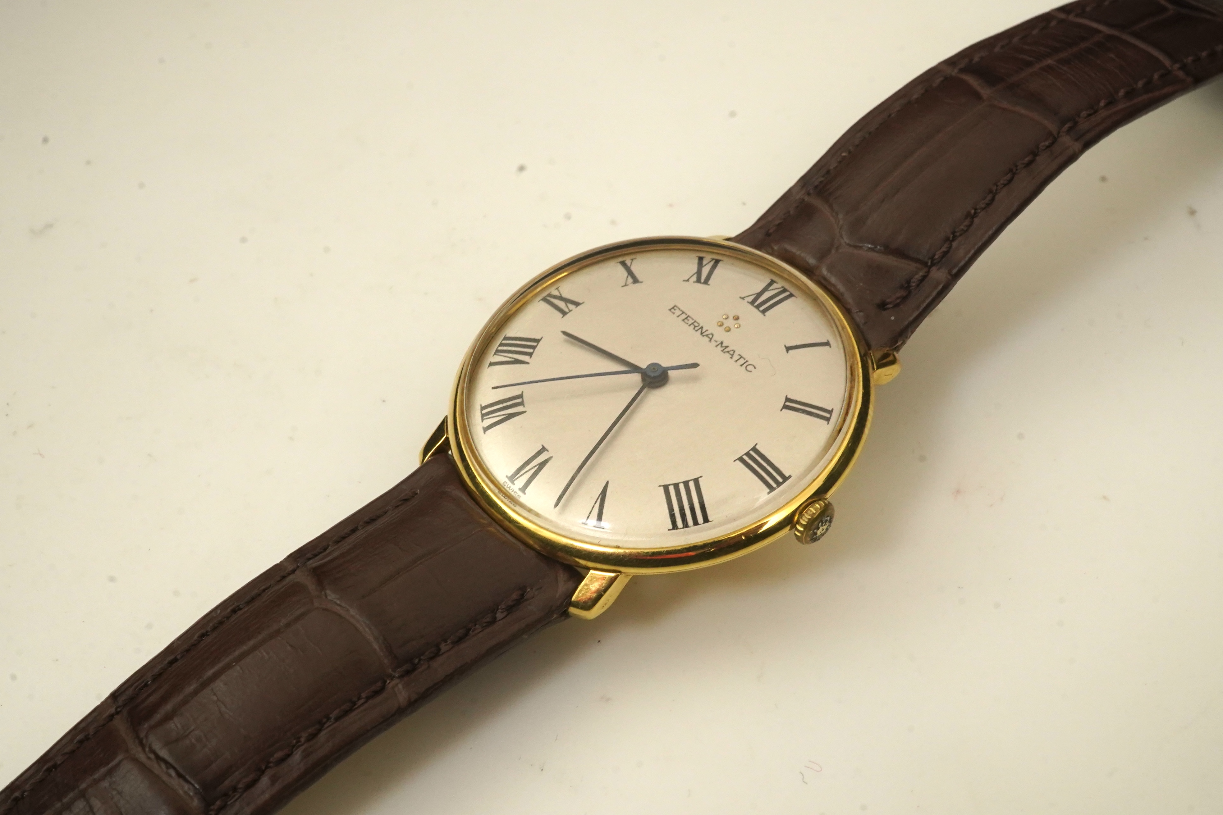 A gentleman's 18ct gold Eterna-Matic manual wind dress wrist watch, on a later associated Hirsch leather strap